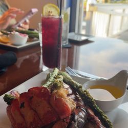 The Waterfront Bistro - Lobster tail, asparagus and blueberry margarita.