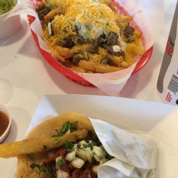The Taco Stand - Carne asado fries at top. Al pastor taco at bottom. - Tacos Near Me - Encinitas, California The Taco Stand - Carne asado fries at top. Al pastor taco at bottom. - Tacos Near Me - Encinitas, California