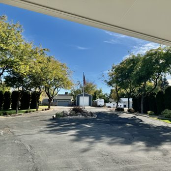 Treasure Tree & Landscape Care - Trees on front driveway trimmed up. - Tree Services Near Me - Nampa, Idaho