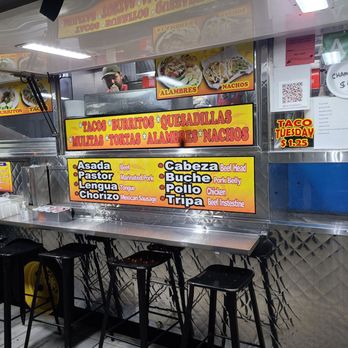 Tacos Jalisco - Outside of the truck close up, with stools at the bar - Mexican Near Me - East San Gabriel, California Tacos Jalisco - Outside of the truck close up, with stools at the bar - Mexican Near Me - East San Gabriel, California