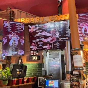 The Library - Bright menu boards and warm tones - The Library Coffee's signature counter. - Coffee & Tea Near Me - Long Beach, California The Library - Bright menu boards and warm tones - The Library Coffee's signature counter. - Coffee & Tea Near Me - Long Beach, California