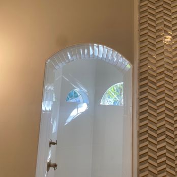 Stephen Wade Gibson Flooring - It was not easy doing curved archway !  They had to cut huge pieces of tile ! - Flooring Near Me
