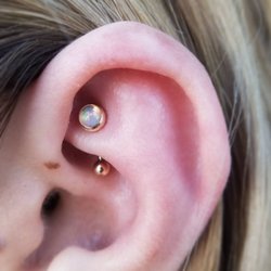 Somatic Body Piercing - Rook piercing by Elise