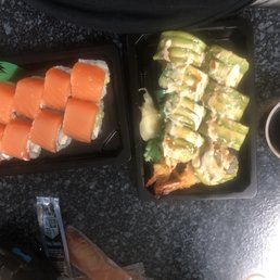 Left, Bagel Roll. Right , Caterpillar Roll with a side of extra eel sauce.