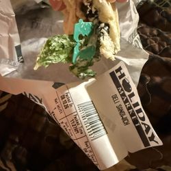 Holiday Market - Deli sandwich. Turkey, sourdough, Swiss, lettuce, tomato, olives, onions. I do not remember ordering plastic bread clips in the order.