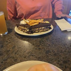 The CI Bar and Grill - Grilled patty melt does not disappoint. Happy cheese sandwich day folks!