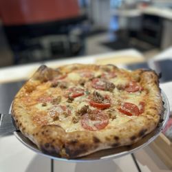 Fire Forno - Marherita and I added sausage. Delicious and a super cheese pull!!!
