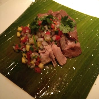 Shokudo - Braised pulled pork on a banana leaf with mango, cilantro and jalapeño - Sushi Bars Near Me - Miami, Florida Shokudo - Braised pulled pork on a banana leaf with mango, cilantro and jalapeño - Sushi Bars Near Me - Miami, Florida