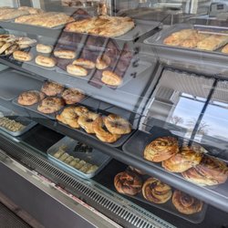 SIMIT HOUSE TURKISH BAKERY - Case filled with baked goods.