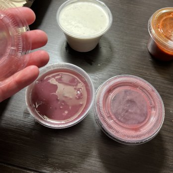 Rusty Moose - Huckleberry (?) sauce/dressing that goes with nothing we ordered. - American Near Me - Spokane, Washington