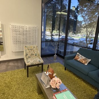 Premier Vision of Dallas - The fuzzy green rub and nice accent chair. - Eyewear & Opticians Near Me - Addison, Texas Premier Vision of Dallas - The fuzzy green rub and nice accent chair. - Eyewear & Opticians Near Me - Addison, Texas