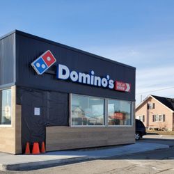 Domino's - Exterior. Drive around the right side to get to the pickup window on the left side of the building