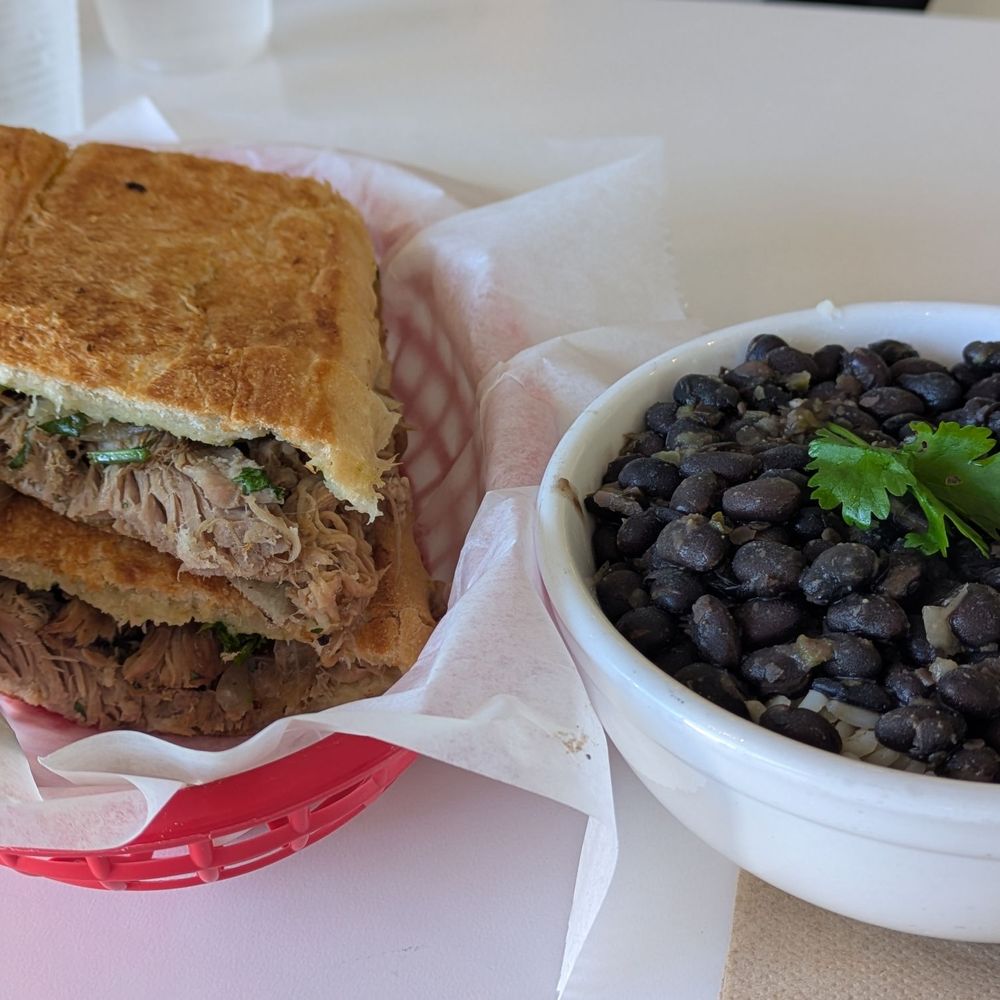 Lechon sandwich + rice & beans