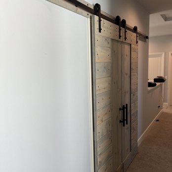 N Alvarado Construction - a view of a hallway with a sliding door - General Contractors Near Me - Marina, California N Alvarado Construction - a view of a hallway with a sliding door - General Contractors Near Me - Marina, California