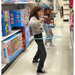 Target - The girls trying out the hula hoops.