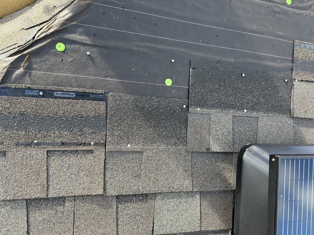 Slide of Reign Roofing