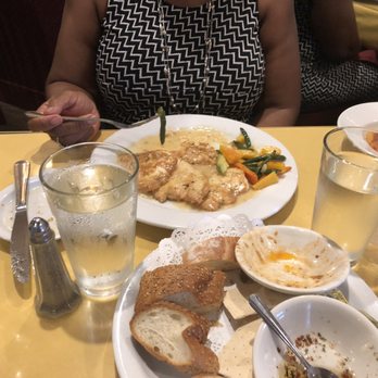 Fratelli - Chicken Fancese (spelling?) with an almost empty starter of bread and some sort of vegetable medley. - Italian Near Me - Bronx, New York