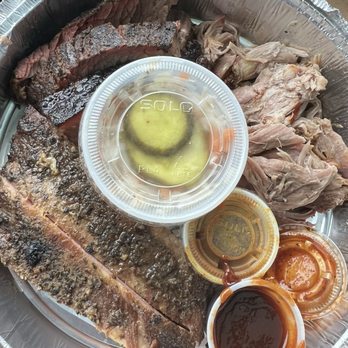Old Blue BBQ - 2 baby back ribs, 1/2 cup of pork and 3 small strips of brisket My Side: small solo cup of cucumber salad - Caterers Near Me - Alexandria, Virginia