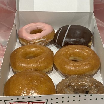 Krispy Kreme - Krispy Kreme donuts (half dozen): Original Glazed, Cream Filled Chocolate, Strawberry Glazed, Pumpkin Spice Cake, and Lemon Filled. - Desserts Near Me - Toronto, Ontario