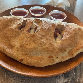 Josie's Pizza & Wings - Large Meat Lover's Calzone - Chicken Wings Near Me - Windermere, Florida