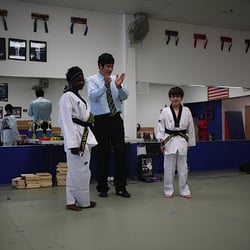 Be Ryong Martial Arts - Master Yun introducing new black belts to the entire studio.