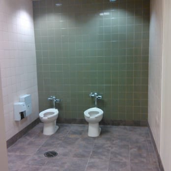 Cerda Construction - two toilets in a public restroom - General Contractors Near Me Cerda Construction - two toilets in a public restroom - General Contractors Near Me