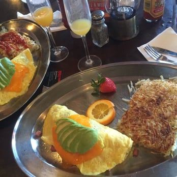 Saddle Ranch - Ham, bacon, cheese and avocado omelets with hash browns and our first (maybe second round of mimosas) - Steakhouses Near Me - Orange, California