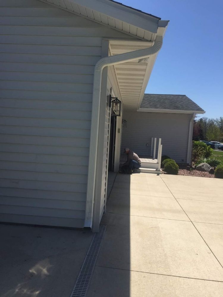 Slide of Triple GGG's Seamless Gutters