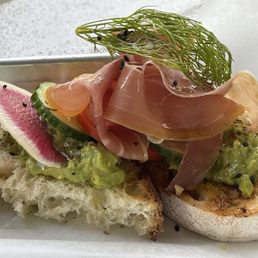 Avocado toast with prosciutto Avocado toast with prosciutto