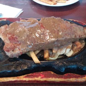 New City Restaurant - $18.99 sirloin steak and fries on a hot plate. Can also choose another side - Chinese Near Me - Markham, Ontario New City Restaurant - $18.99 sirloin steak and fries on a hot plate. Can also choose another side - Chinese Near Me - Markham, Ontario