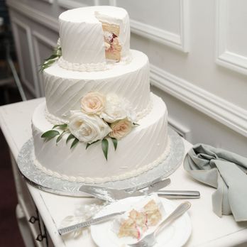 Van's Bakery - a wedding cake on a table - Bakeries Near Me - Garden Grove, California