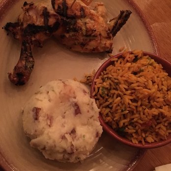 Nando's Peri-Peri - 1/4 chicken leg with sides of Portuguese rice and mashed potatoes - Portuguese Near Me - Washington, DC, District of Columbia Nando's Peri-Peri - 1/4 chicken leg with sides of Portuguese rice and mashed potatoes - Portuguese Near Me - Washington, DC, District of Columbia
