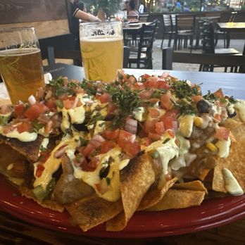 Slackwater - Riverwoods - Chili verde nachos. Don't try to eat by yourself. - Pizza Near Me - Provo, Utah Slackwater - Riverwoods - Chili verde nachos. Don't try to eat by yourself. - Pizza Near Me - Provo, Utah