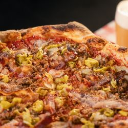 Side Project Pizza - The SPB

Red sauce, house-made pork sausage, pepperoncini, parmesan, bacon