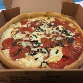 Don Chendo - Margherita pizza delivered but not cut - Pizza Near Me - Playa del Carmen, ROO Don Chendo - Margherita pizza delivered but not cut - Pizza Near Me - Playa del Carmen, ROO