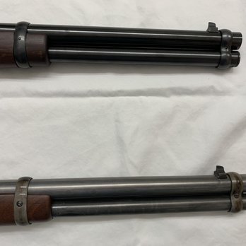 Lohman Gunsmith - This is an image of the rifle I received from Lohman, compared to a brand new Winchester with the barrel bands correctly installed. - Machine Shops Near Me - Houston, Texas Lohman Gunsmith - This is an image of the rifle I received from Lohman, compared to a brand new Winchester with the barrel bands correctly installed. - Machine Shops Near Me - Houston, Texas