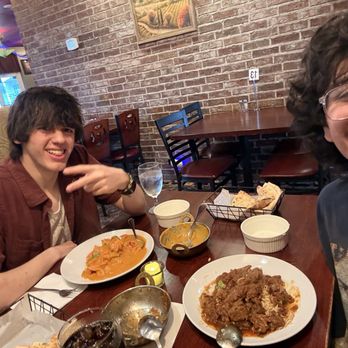 Edmond Paradise - Mutton Rogan Josh Chicken Tikka Masala Cheese Garlic Naan Two handsome young men - Indian Near Me - Edmond, Oklahoma Edmond Paradise - Mutton Rogan Josh Chicken Tikka Masala Cheese Garlic Naan Two handsome young men - Indian Near Me - Edmond, Oklahoma