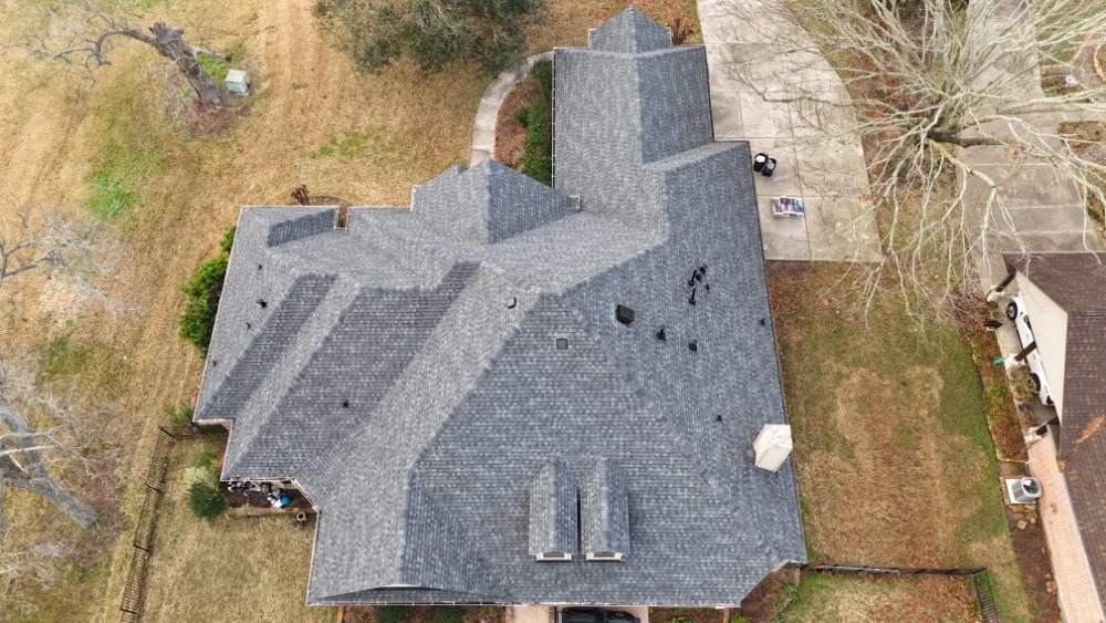 Slide of The Roofing Consultants