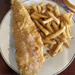 Battered haddock and french fries Battered haddock and french fries