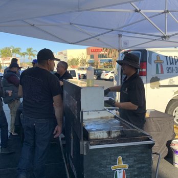 Tap’s Taco Catering - a man serving food - Tacos Near Me - Temecula, California Tap’s Taco Catering - a man serving food - Tacos Near Me - Temecula, California