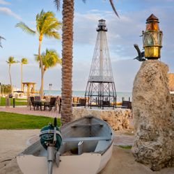 The Caribbean Resort - Antique Beacon light and replica alligator lighthouse.