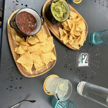 Toasted - Chips and guacamole and salsa Gin and cucumber tonic - Breakfast & Brunch Near Me - Manitou Springs, Colorado Toasted - Chips and guacamole and salsa Gin and cucumber tonic - Breakfast & Brunch Near Me - Manitou Springs, Colorado