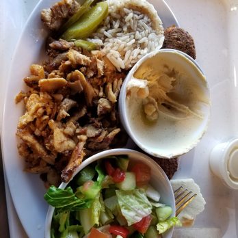 FelFel Mediterranean - Yummy spicy chicken shawarma plate with brown rice, hummus, green side salad and pita bread. 2 falafels to try. - Mediterranean Near Me - Denver, Colorado FelFel Mediterranean - Yummy spicy chicken shawarma plate with brown rice, hummus, green side salad and pita bread. 2 falafels to try. - Mediterranean Near Me - Denver, Colorado