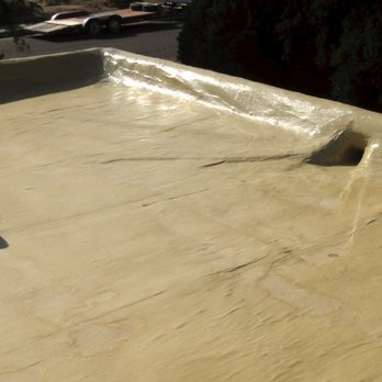 SunRise Roofing - This used to be a lake...no more! Feels like a dance floor when you walk on it. It's not white so crows won't think it's snow and peck at it - Roofing Near Me - Albuquerque, New Mexico