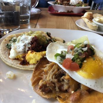 Egg - Chorizo and queso breakfast taco, and carnitas tostada. - Breakfast & Brunch Near Me - Saint Louis, Missouri