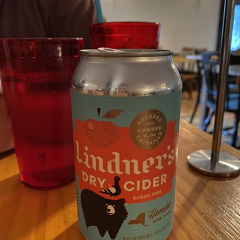 Hamden Inn - a can of dry cider next to a red glass - American Near Me - Hamden, New York Hamden Inn - a can of dry cider next to a red glass - American Near Me - Hamden, New York