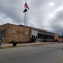 US Post Office - Right on main street across from the library (low on parking)