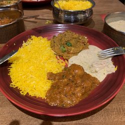 Kashmere - L clockwise -Saffron rice, eggplant, lotus stems, and potatoes.