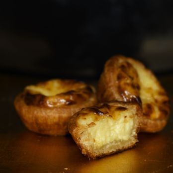 Pastel de Nata - a couple of pastries on a table - Patisserie/Cake Shop Near Me - San Diego, California Pastel de Nata - a couple of pastries on a table - Patisserie/Cake Shop Near Me - San Diego, California