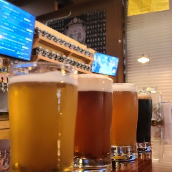 Debellation Brewing Company - Flight - Beer Gardens Near Me - Richmond Hill, Georgia Debellation Brewing Company - Flight - Beer Gardens Near Me - Richmond Hill, Georgia
